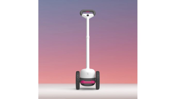 photo of a Glide navigation device featuring a white and dark grey football size object at the bottom with 2 dark grey wheels and a long white handle